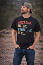 Load image into Gallery viewer, Husband Daddy Protector Hero Graphic Tee – Unisex Heavy Cotton T-Shirt - krisglamcloset
