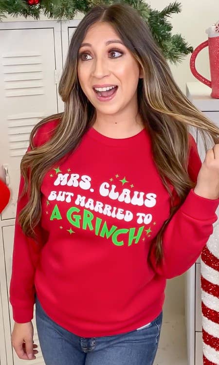 Mrs. Claus But Married to A Grinch Graphic Sweatshirt